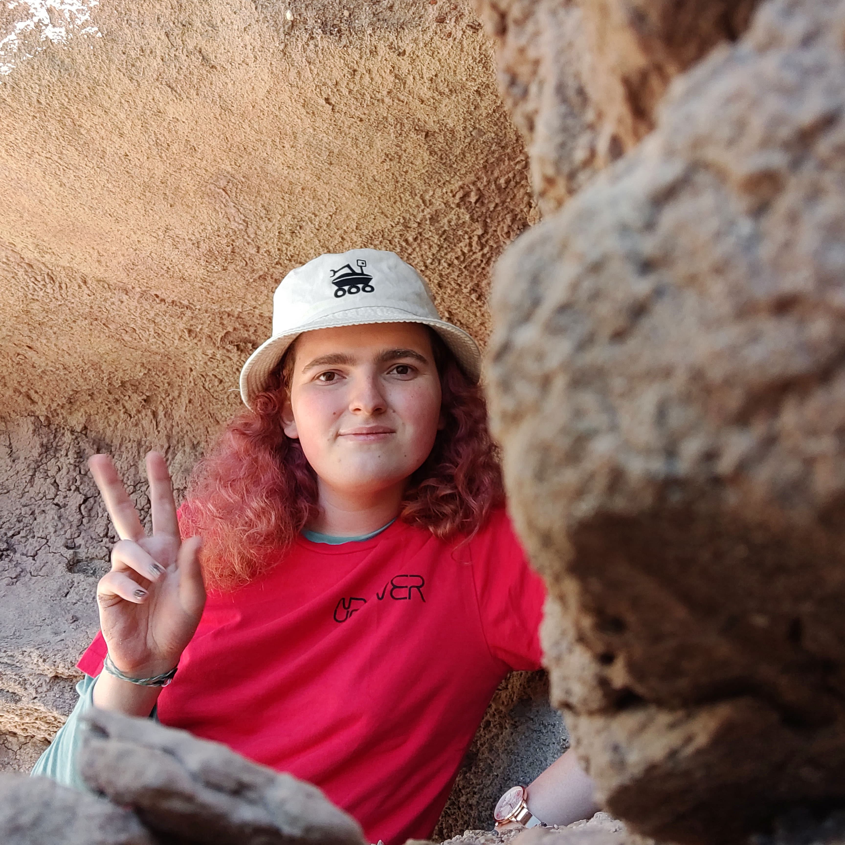 me in front of some rocks at an old dino dig!